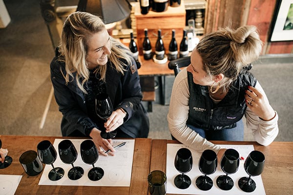 women wine tasting